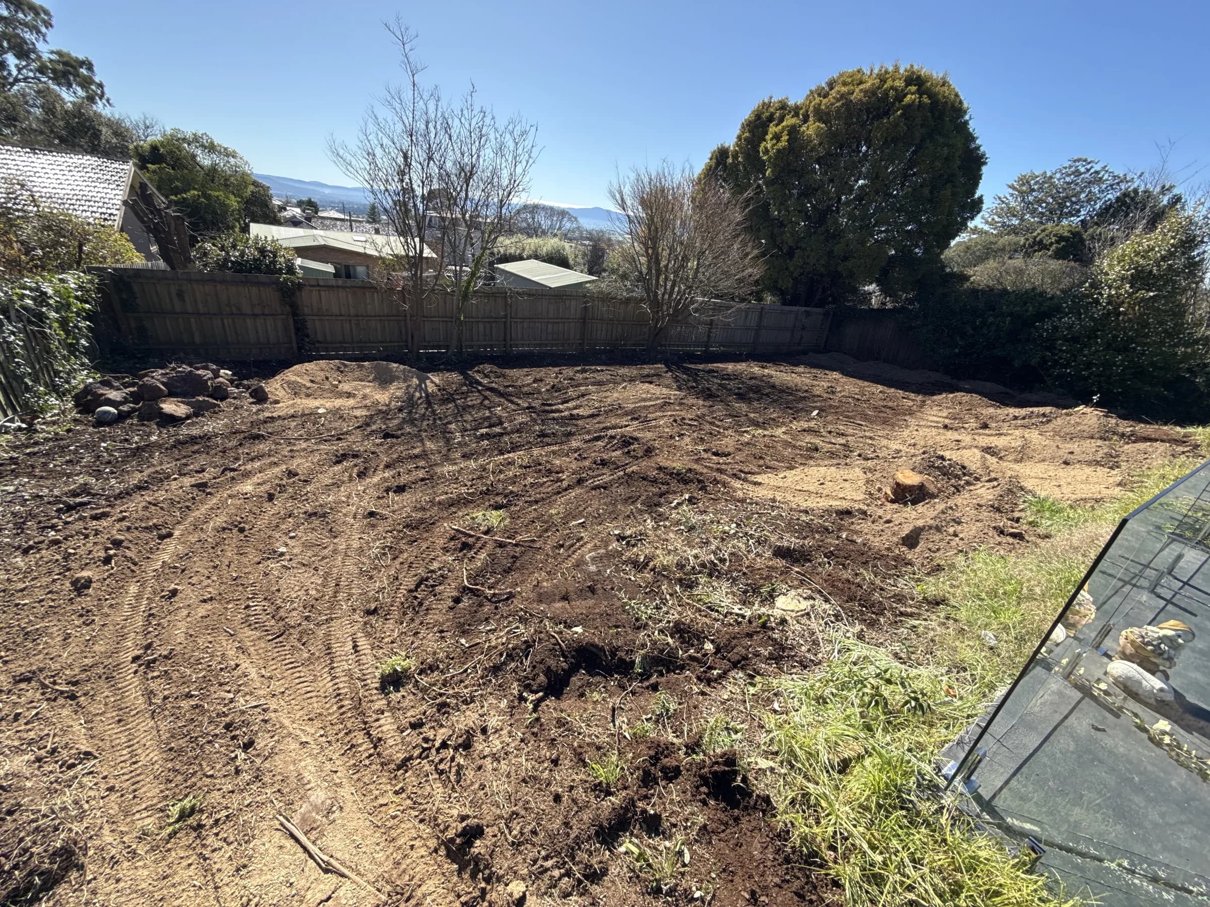 Cleared and levelled block with excavator tracks